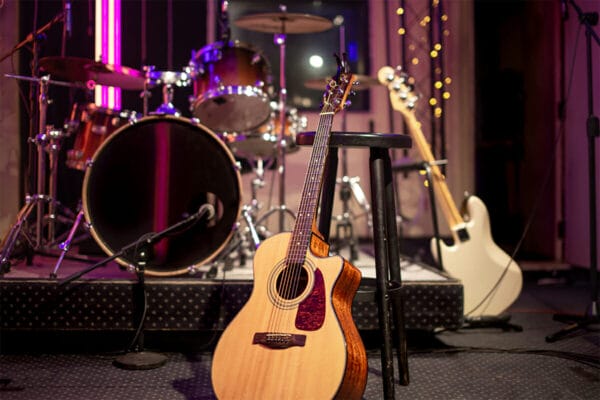 acoustic-guitar-on-the-background-of-a-recording-s-N53QKT4 Backline gear rental from Cadence Studios